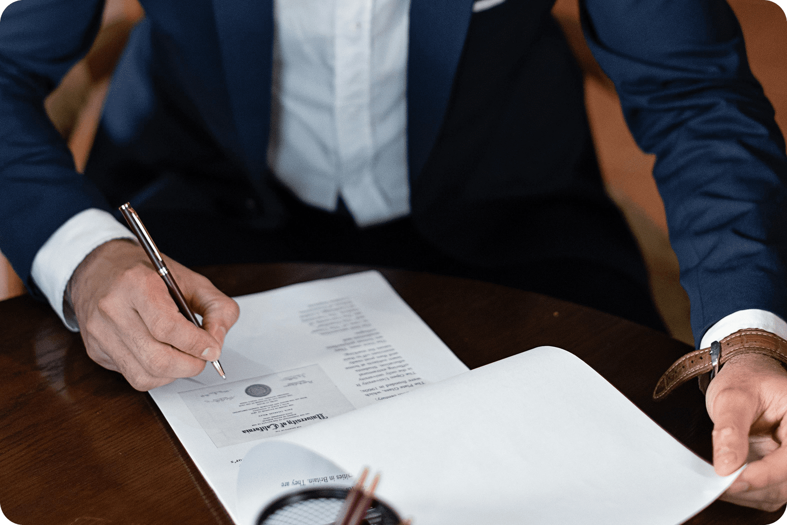 Lawyer signing documents