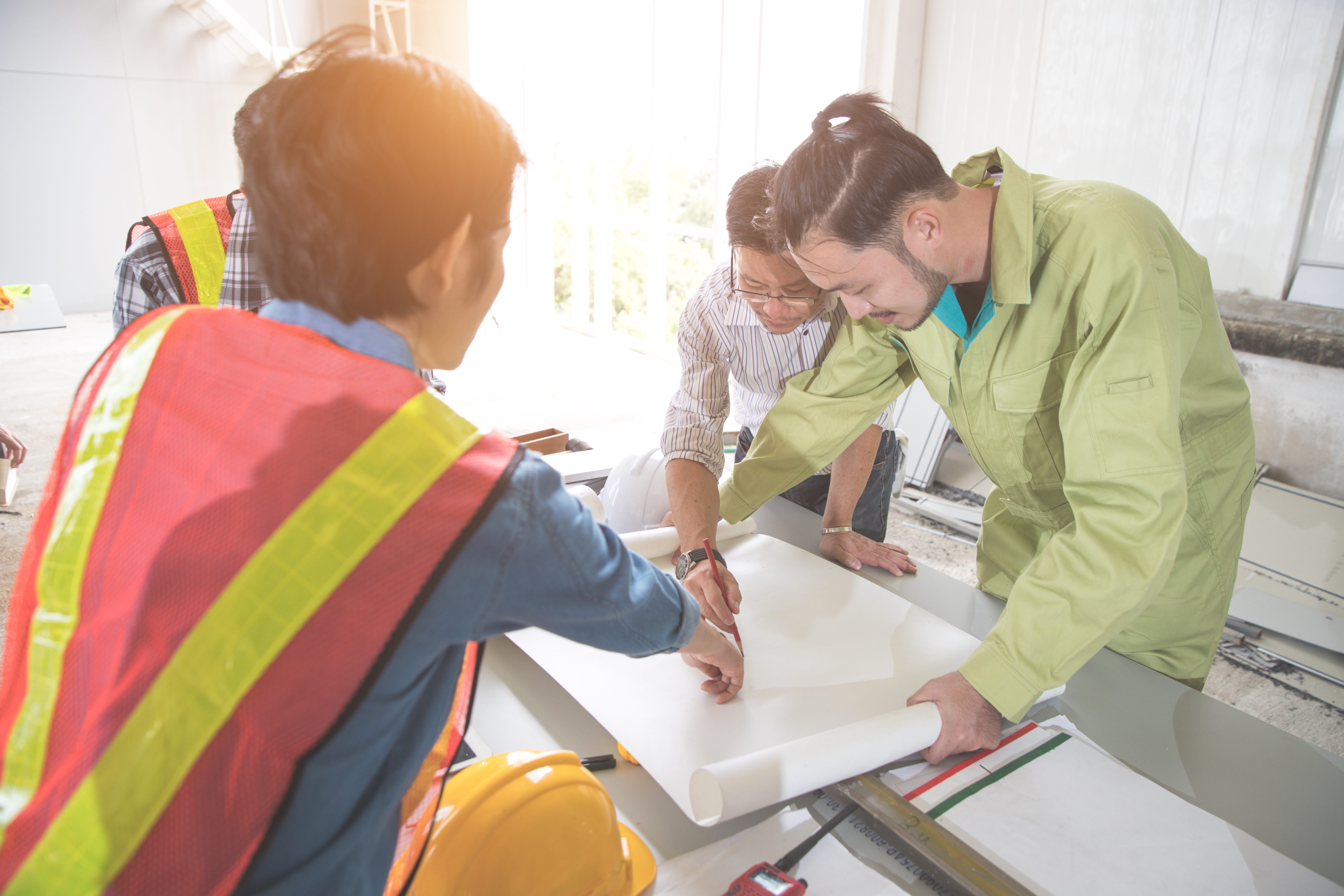 engineer people working and discussing with architecture or blue Federal Skilled Worker Program (FSWP) & Canadian Experience Class (CEC)
