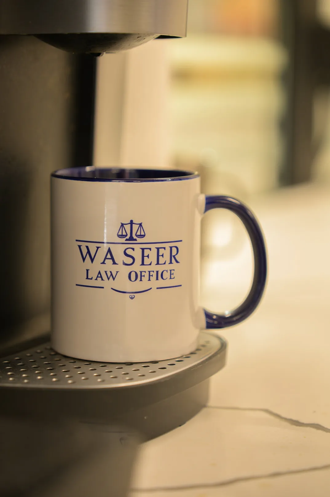 A Waseer Law Office coffee mug at our London office