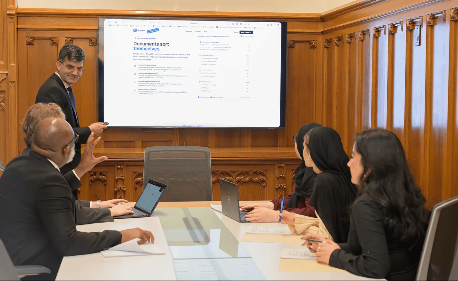 Zia Waseer meeting with the Waseer Law Office team in the boardroom